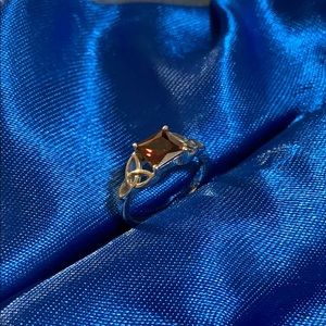 Sterling silver Celtic garnet princess cut ring